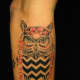 Owl tattoo on arm