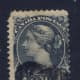 This stamp from Canada shows a heavy cancel and is off-center. The perforations on the right side are cut into the design. Still collectible if you cannot find a better copy at a decent price.