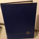 A regular size stockbook, about 8" x 11".