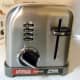 Notice the four settings, dial number for shade of toast and the heavy push down tab.