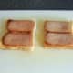 Fried Spam slices on toast