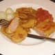 Tucking in to Spam fritters