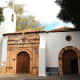 The decorative entrance of the 17th century Iglesia de Nuestra Senora de Regla in Pajara  is believed to exhibit Aztec influences brought back by Spanish conquistadores, including sun, snake and jaguar depictions
