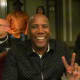 Nathan East, who plays bass guitar gives a quick peace sign at the end of their performance at the Berks Jazz Festival.