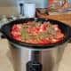 If you'd prefer to do this in the crockpot, that's just fine as well. I use mine to cook an extra recipe of pasta sauce while my full pot is cooking.
