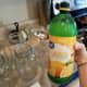 Step 19: Add 2 tablespoons of lemon juice to each quart jar.