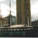The USS Constellation, foreground, The World Trade Center in Baltimore, the Pratt Street Pavilion in the background.