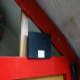 Side brace glued and screwed into corner of cupboard frame, and rear left speaker placed into its new location