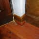New skirting board wood dyed and beeswax polished to blend in with the surrounding furniture