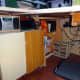 Old Ikea desk in its new location, making the storage under the main desk better organised