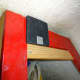 Wooden decorative facing glued and screwed in place for the rear right speaker