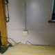 Phone socket behind monitor that the desktop printer used to plug into for faxes