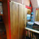 Completed wardrobe in office, with folding door shut