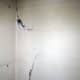 Cracked plaster at the back of the wardrobe; to be repaired