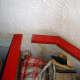 Section cut from the cupboard frame, for the speaker to slip into.