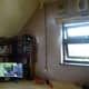 Channel chiselled into wall from the ceiling down to the socket