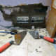 Cementing the metal back boxes in place, and leaving for 24 hours to dry