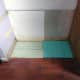 Adding a piece of spare underlay which I had in my shed, in the corner to match the existing