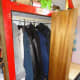 Folding doors open, showing the clothes rail before the modifications