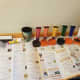 Set up painting station with paint, containers for paint, cups of water to clean brushes, magnets, gluestick, and googly eyes. You may also want a charpie marker and something to clear off brush.