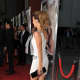 Kate Beckinsale Premiere in Los Angeles in a white short dress and high heels making her way down the red carpet