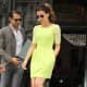 Pretty yellow dress and sexy high heels for a Total Recall appearance