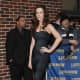Kate Beckinsale arriving at the Late Show wearing a strapless tight dress and black high heels