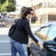 Kate in skinny jeans and booties