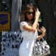 Kate Beckinsale in a white romper and silver heels