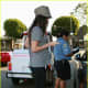 Megan Fox in leggings and funky high heels getting a ticket