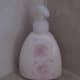 The triangular shaped bottle of this soap dispenser makes good use of this tiny corner space.