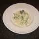 Broccoli and Stilton tagliatelle is plated and ready to be garnished