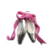 Silver ballet slipper charms are perfect for ballet aficionados or aspiring ballerinas! Make the ribbons from pink polymer clay, if you like.