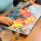 Pull up the paint with a soft cloth or paper towel.