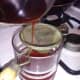 Strain out the fine particles with a tea strainer.