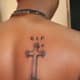 R.I.P. Tattoo With Cross and Text