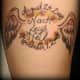R.I.P. Tattoo With Names, Dates, and Wings