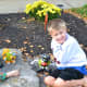 The kids were eager to show off their Mr. Potato Head Osage Oranges