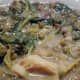 Kalunay leaves or red spinach in a dish made of mung beans, seasoned with fish sauce.