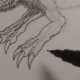 Carefully ink the front legs and add more form.