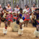 Zwazi men and women wearing traditional clothes 