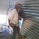Strength and teamwork are important in fitting sheets. If possible, keep your feet and hands out from under the sheets.