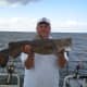 Gone Fishin Club Member Stacy with a small Flathead Catfish