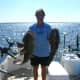 Gone Fishin Club Member Gary with two flathead catfish before we released them. The one on the left is heavier.