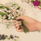 Vintage hand with forget-me-nots Valentine flowers
