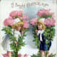 Easter cards: Two cute kids in flower pots with pink chrysanthemums &quot;A bright Easter to you&quot;