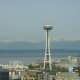 A sunny spring day with the snow-capped Olympic Mountains behind