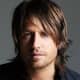 Keith Urban, 45, wearing layered long hair.  To get the Keith Urban look shampoo hair and condition.  Let dry naturally and with a small amount of gel, run your fingers through your hair. - 2013 Hairstyles for Men Short Medium Long Hair Styles Haircu