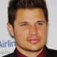 Nick Lachey, 39, has the perfect medium hair style for a round face.  The short cut on the side and long straight up on top makes the face look longer. - 2013 Hairstyles for Men Short Medium Long Hair Styles Haircuts, by Rosie2010