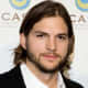 Ashton Kutcher, 35, wears his long layered hair parted just slightly to the side. - 2013 Hairstyles for Men Short Medium Long Hair Styles Haircuts, by Rosie2010